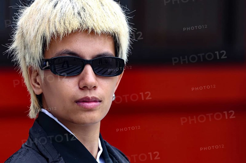 Young man with blonde hair and sunglasses in modern style, Tokyo, Asakusa, Japan