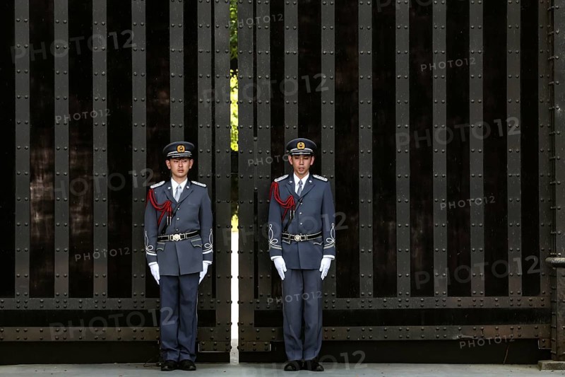 Guards in uniforms at the Imperial Palace gate during the changing of the guard, Tokyo, Japan