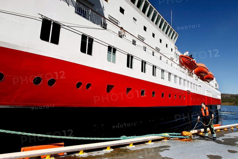 Worker prepares to sail a Hurtigruten ship in Kirkenes, Kirkenes, Finnmark, Norway