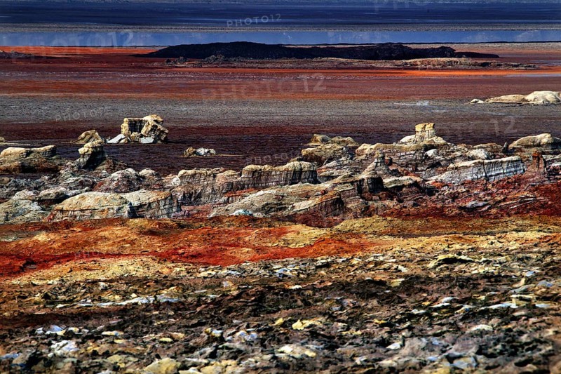Dallol's impressive rocky landscape in warm shades of red and brown, zero