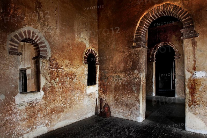Stone wall with arches and windows inside a castle in historic Gondar, Gondar, Amhara, Ethiopia