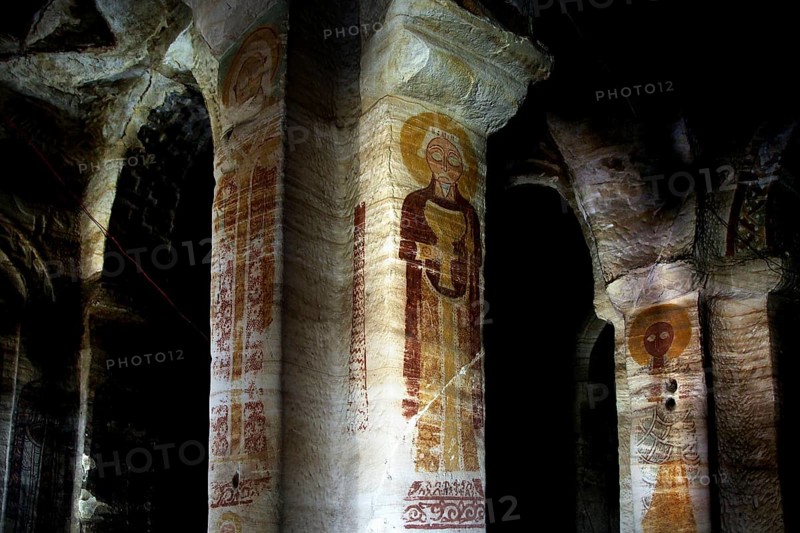 Interior view of Debre Mariam Krokor rock church with impressive frescoes on the pillars, zero