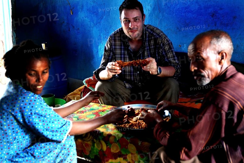 Visiting Chuchu's family in Lalibela, eating together in a cozy atmosphere, Lalibela, null