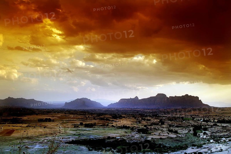 View of silhouetted mountains from Gheralta Lodge at dramatic sunset, Hawzien, zero, Ethiopia