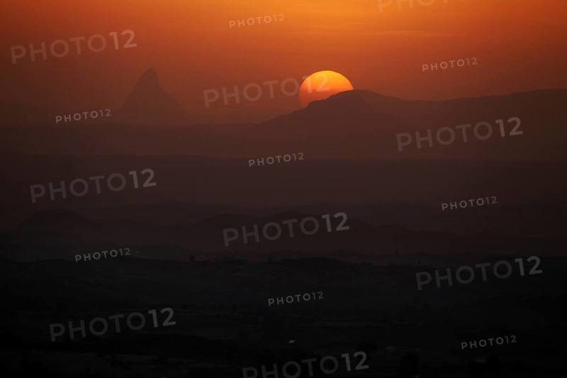 Spectacular sunset at Gheralta Lodge with silhouetted mountains, Hawzien, Tigray, Ethiopia