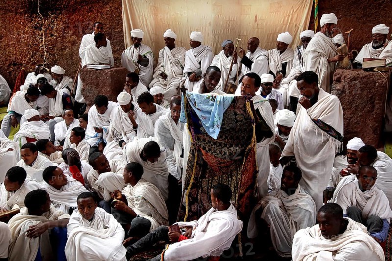 Many in white robes gather for a festive Easter service in Bete Maryam, Lalibela, Ethiopia