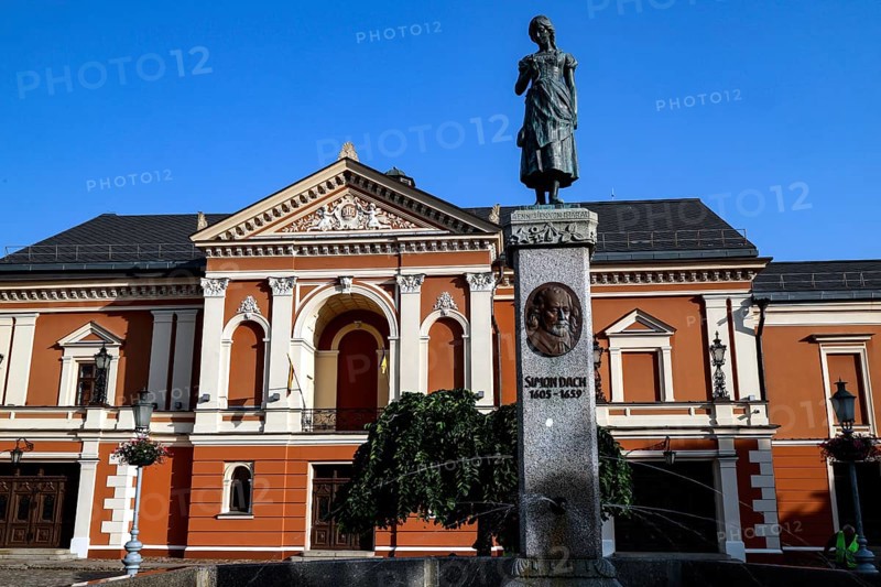 Historic theatre on Theatre Square with the Angel of Tharau statue in the old town, Klaipeda, Klaipeda County, Lithuania