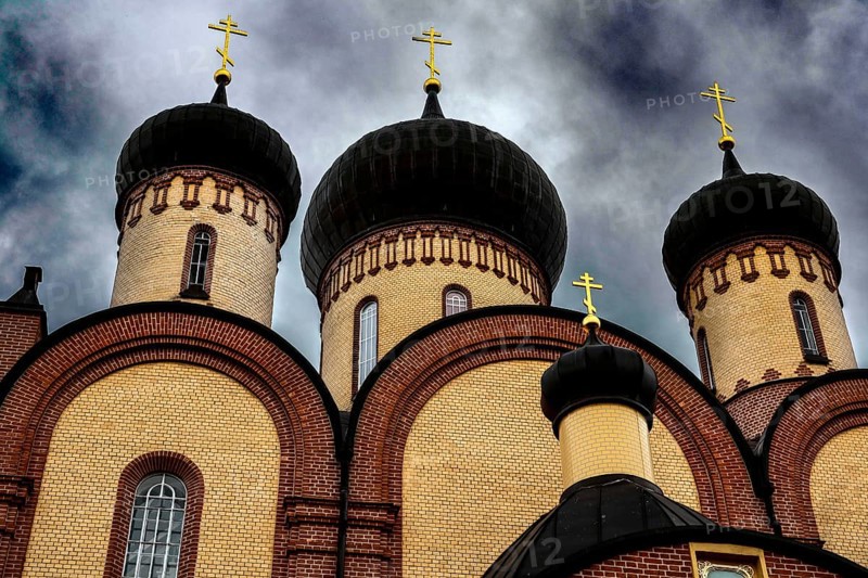 Detail of the main Orthodox church in the Pühtitsa nunnery with distinctive domes, Kuremäe, Estonia