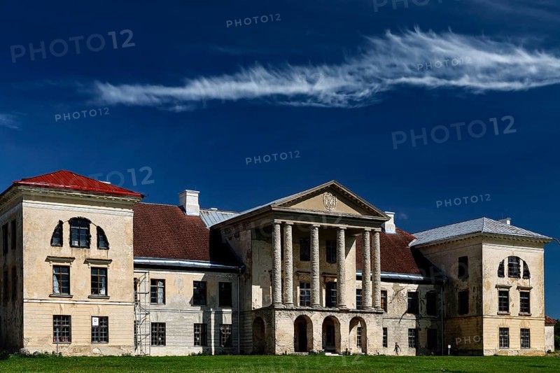 Historic manor house with classic architecture under a clear sky in Kolga, Kolga, Estonia