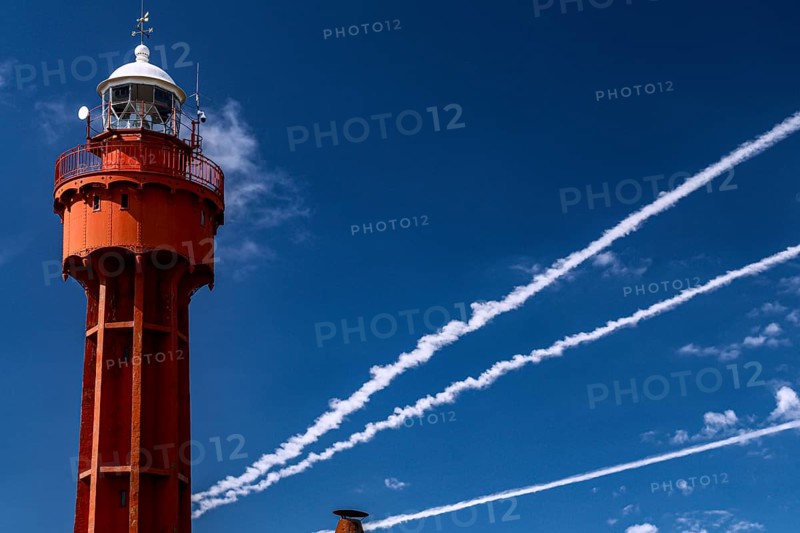 Red lighthouse of Ristna against a clear blue sky, Hiiumaa, Ristna, Estonia