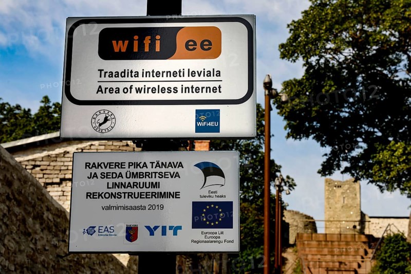 WiFi sign in Rakvere with a tree and a city wall in the background, Rakvere, null, Estonia