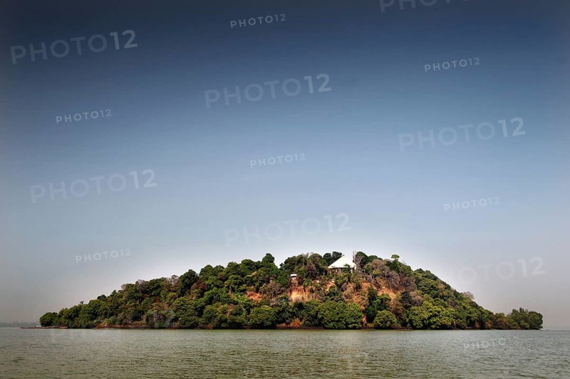 Green island surrounded by the clear water of Lake Tana, Lake Tana, Amhara, Ethiopia