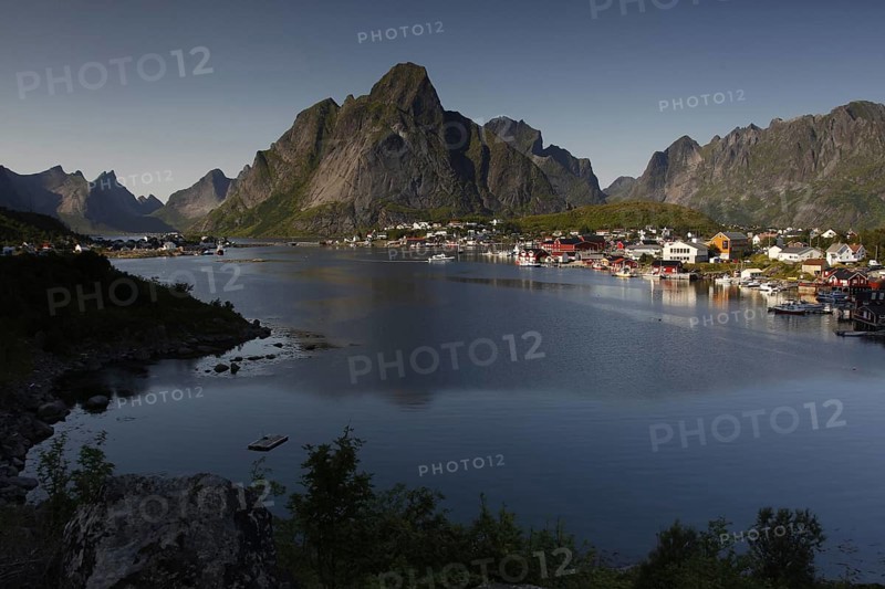 View of Reine and Hamnøay with water and impressive mountain scenery of Lofoten, Reine, Moskenesøy, Norway
