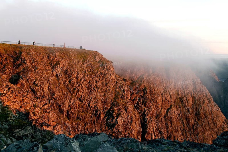 View of the dramatic mist-wrapped cliffs at the North Cape, North Cape, Magerøya, Norway