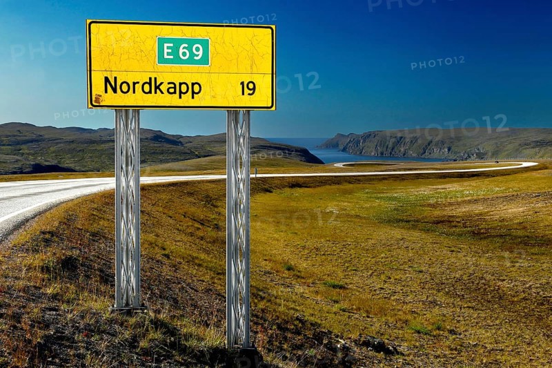 Road sign to the North Cape on the E69 in front of a vast landscape, Nordkapp, Magerøya, Norway