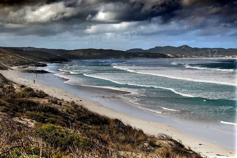 Wide coastal landscape with rough waves and cloudy sky near Vivonne Bay, Vivonne Bay, Kangaroo Island, Australia