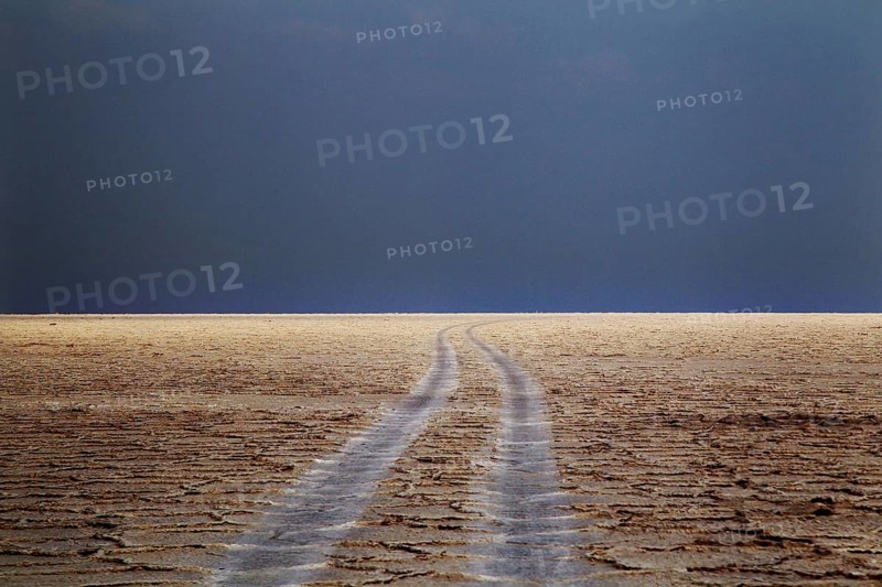 Deserted road leads infinitely far in the desert, Dallol, Asale, Ethiopia