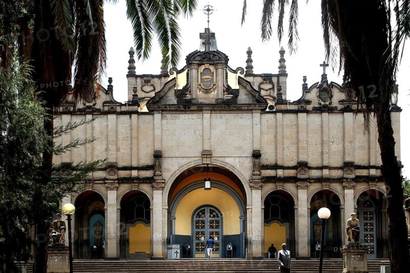 Impressive façade of the Trinity Church in Addis Ababa, framed by palm trees, Addis Ababa, null, Ethiopia
