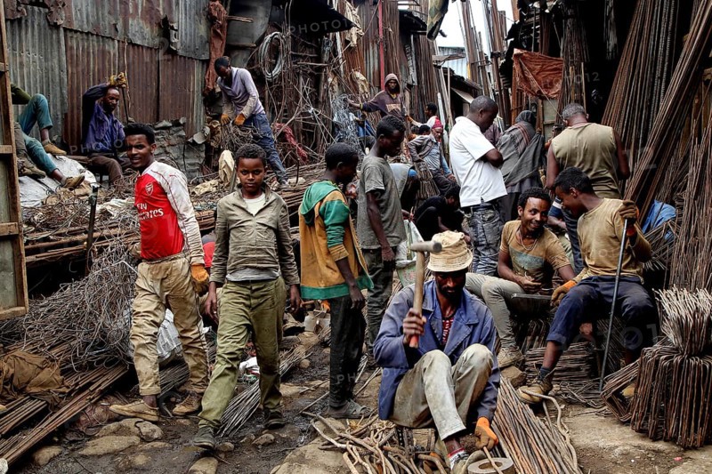 Craftsmen work on metal work on the busy Mercato in Addis Ababa, Addis Ababa, Ethiopia