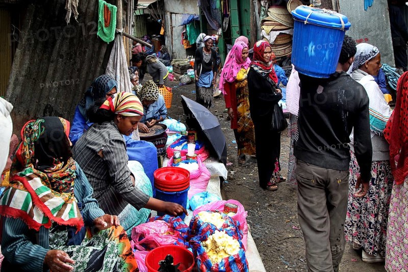 Bustling market street full of people and colorful goods, Addis Ababa, Mercato, Ethiopia