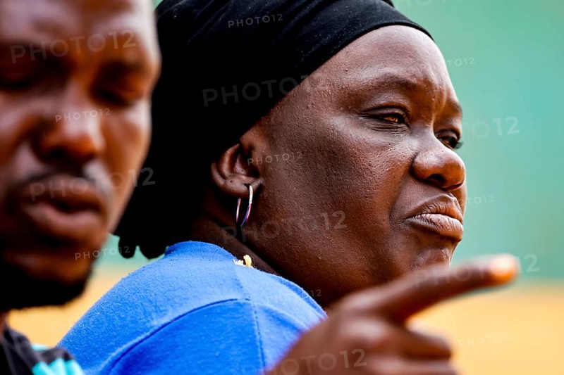 Close-up of Rokia talking during a house visit to CI, Korhogo, CI, Côte d'Ivoire