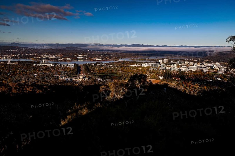 Panoramic view of Canberra from Mount Ainslie Lookout, framed by wide sky and clouds, Canberra, Australian Capital Territory, Australia