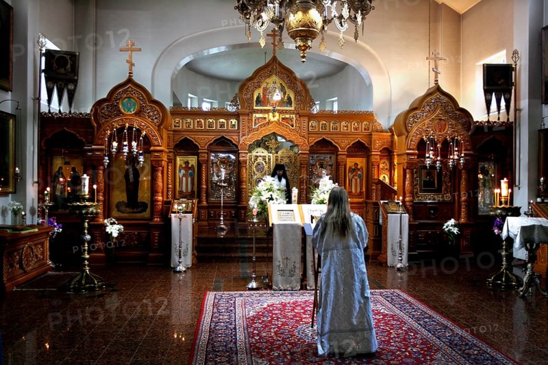Interior view of Uusi Valamo monastery in Heinävesi during a church service with an impressive iconostasis, Heinävesi, Finland