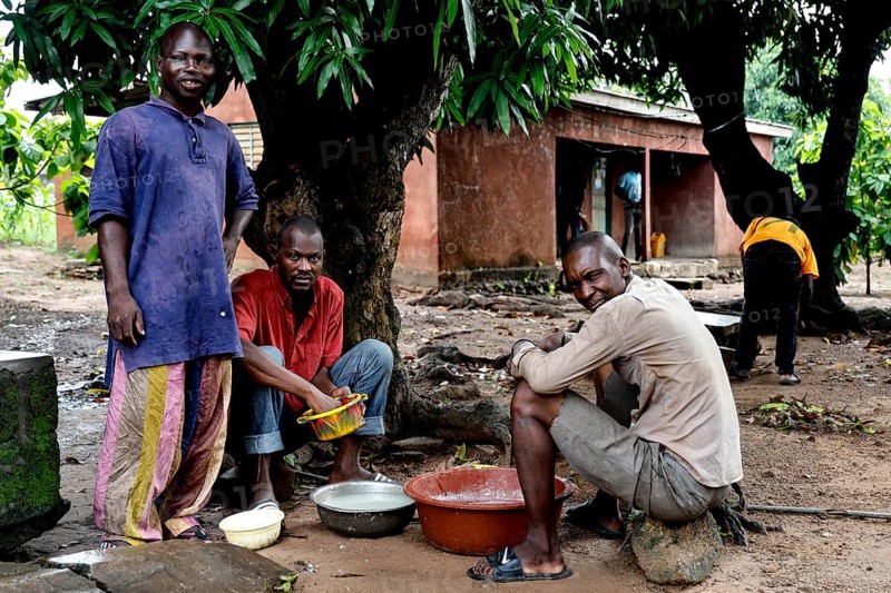Patients relax in the courtyard of a psychiatric rehabilitation center for men in Dar Es Salam, CI Bouaké, Dar Es Salam, Ivory Coast