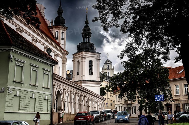 Street in Vilnius with a view of a monumental church and dramatic sky, Vilnius, Vilnius County, Lithuania