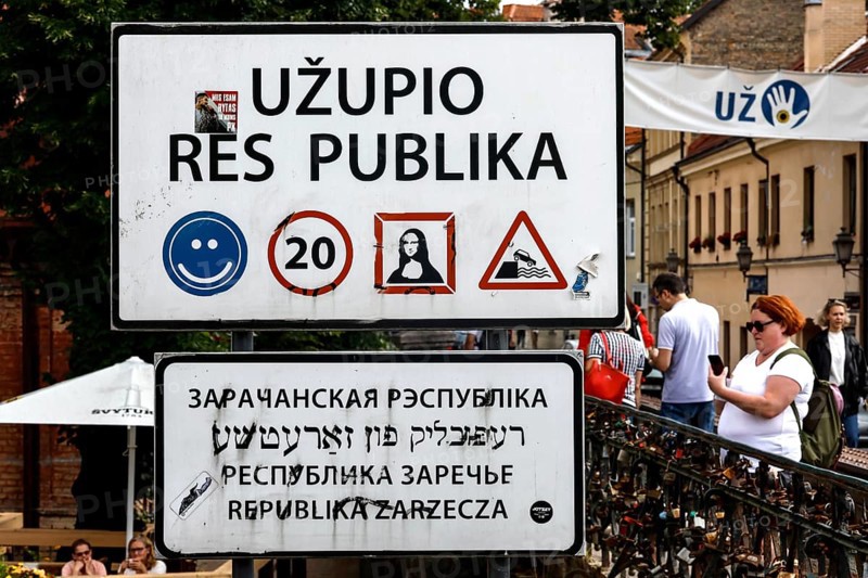 Užupis Republic border sign with pictograms and multilingual inscriptions, Vilnius, Užupis, Lithuania