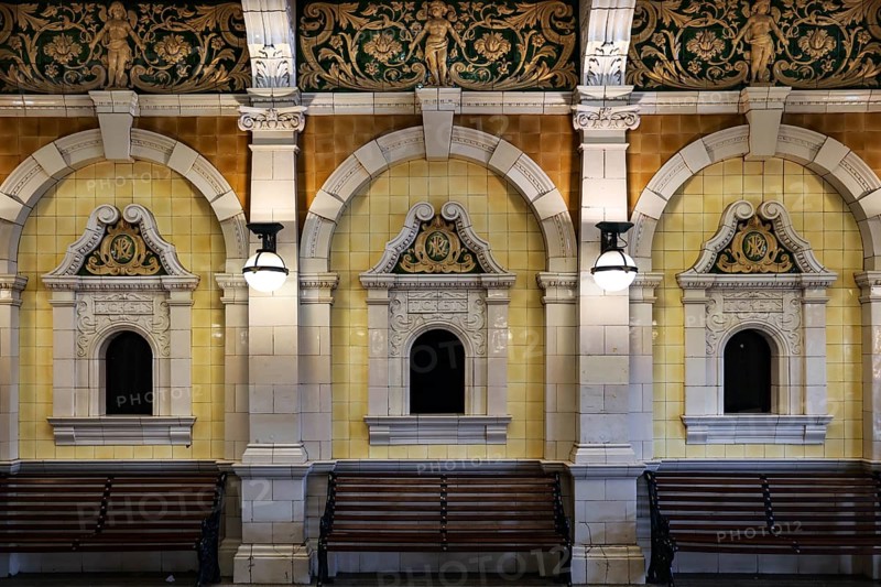 Elegant historic architecture of Dunedin railway station with benches, Dunedin, null, New Zealand