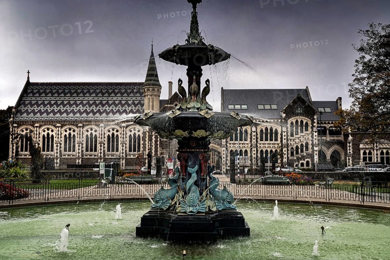 Impressive fountain in front of the Canterbury Museum in Christchurch under cloudy sky, Christchurch, Canterbury, New Zealand