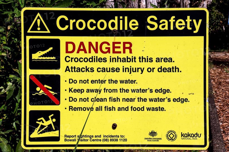 Crocodile safety warning sign in Kakadu National Park, Kakadu National Park, Northern Territory, Australia