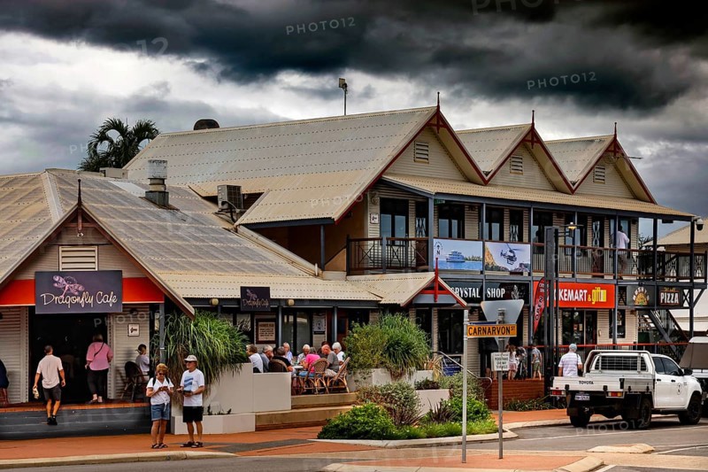 Lively street scene with shops and people on Carnarvon Street, Broome, Western Australia, Australia
