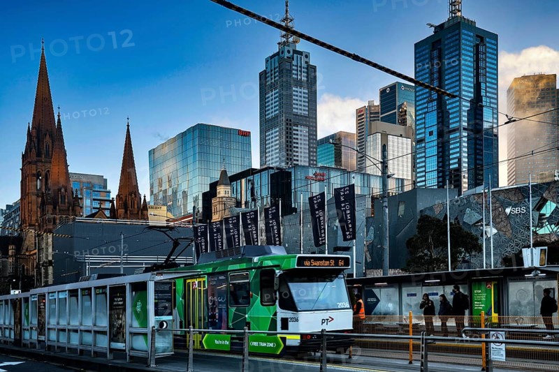 Modern skyscrapers and streetcar next to Federation Square in Melbourne, Melbourne, Victoria, Australia