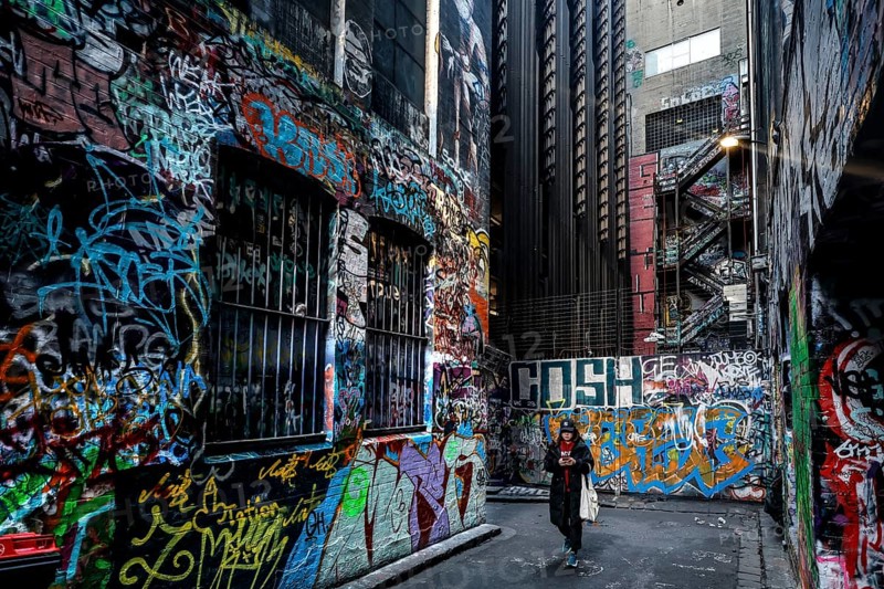Colourful graffiti adorns the walls of Rutledge Lane in a colorful alley, Melbourne, Victoria, Australia