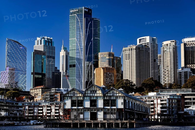 Modern skyscrapers at Walsh Bay in Sydney with water in the foreground, Sydney, NSW, Australia
