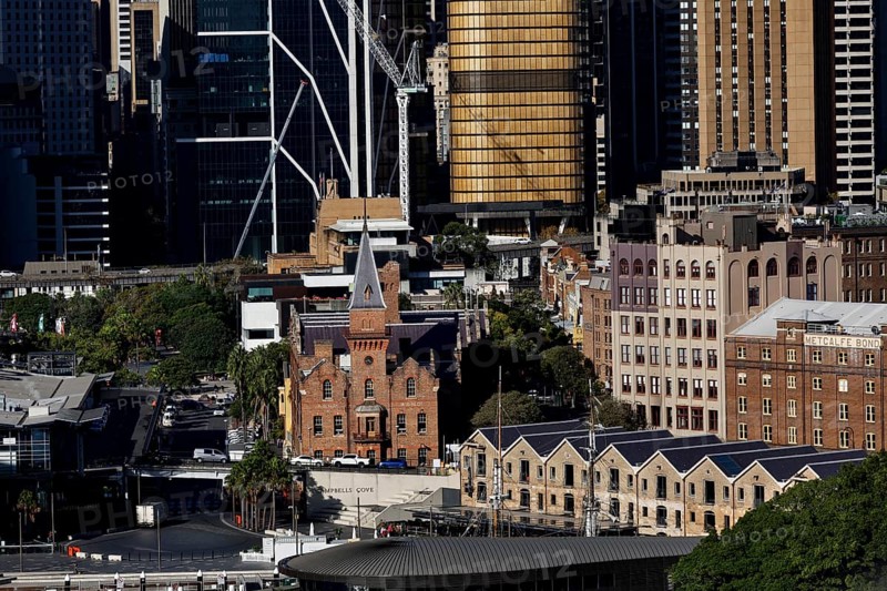 Historic brick architecture surrounded by modern skyscrapers in the city, Sydney, New South Wales, Australia