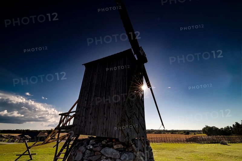 Silhouette of a mill in Angla at sunset on Saaremaa Island, Angla, Saaremaa, Estonia