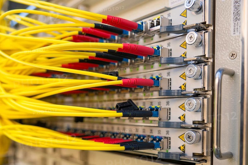 Yellow cables are plugged into a technical connection panel, Fiberglass-ground-breaking ceremony, Dornstetten, Freudenstadt, Germany