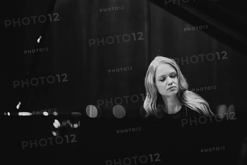 Boy, woman, pianist, with concentrated facial expression and closed eyes playing on a Steinway & Sons grand piano, black and white photo, Stuttgart, Baden-Württemberg, Germany