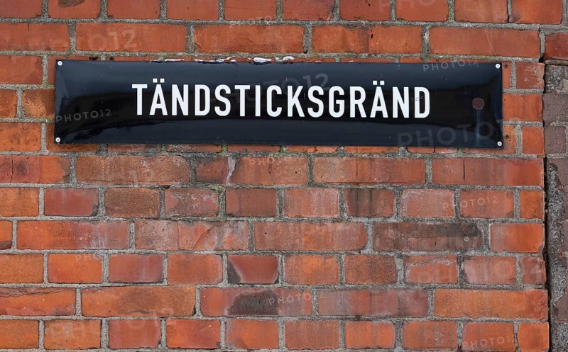 Street sign Tändsticksgränd on brick wall, Tändsticksmuseet match museum or match museum, Jönköping, Jönköpings län, Sweden