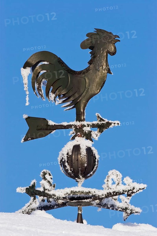 Weather vane with wind rose in snow in winter, hoarfrost, Bavaria, Germany