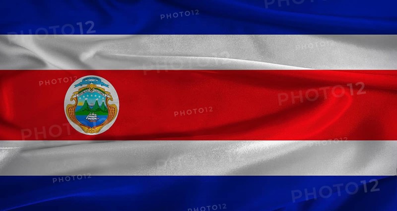 Flag of Costa Rica with fabric textured background. Close up of National flag of Costa Rica with realistic texture