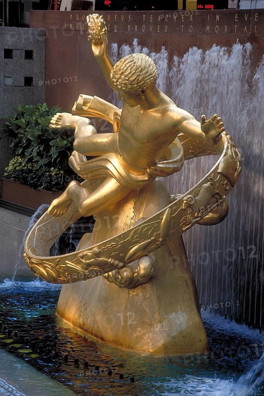 Gold-colored Prometheus statue in Rockefeller Center, New York City, USA