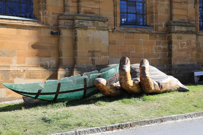 The glass ark, artists Ronald Fischer and Hubert Stern, a five metre long art object supported by a wooden hand, artists Tomas Indra and Libor Kuzdas. Here at a station in front of the Vierzehnheiligen pilgrimage church, Lichtenfels district, Upper Franconia, Bavaria, Germany (permanent work of art in public space)