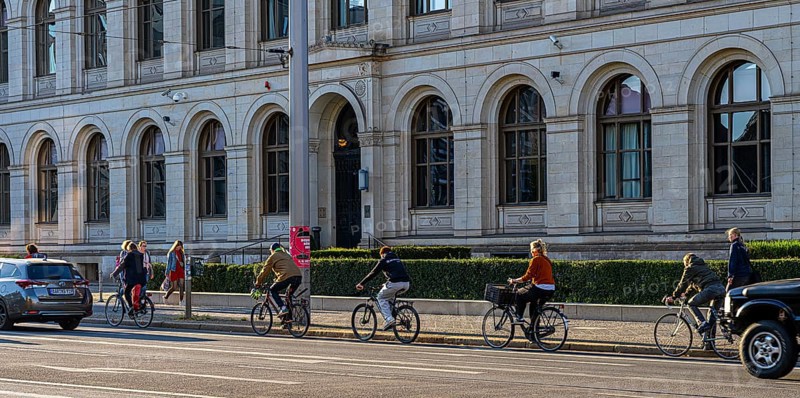 Cyclists on Invalidenstraße in front of the Federal Ministry of Economics and Energy building, Berlin, Germany