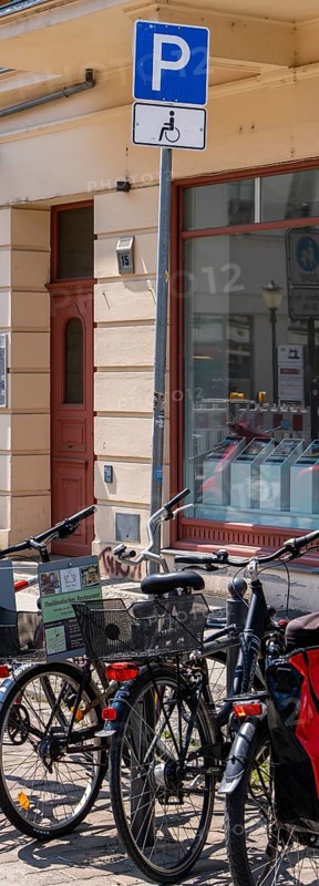 Parking space for disabled people blocked by bicycles, Potsdam, Brandenburg, Germany