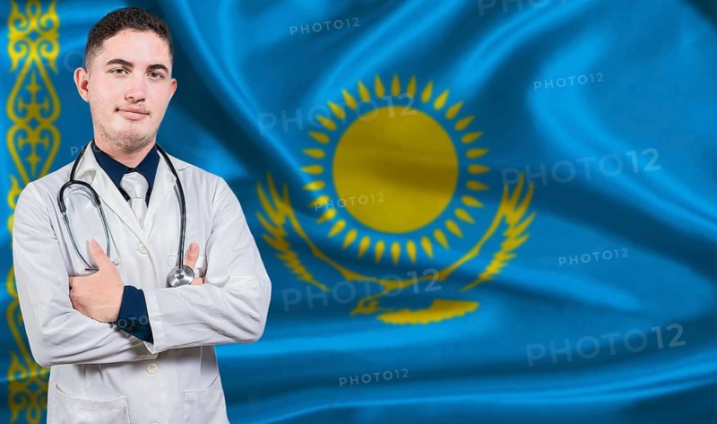Portrait of medical professional on Kazakhstan flag background. Kazakh national health system