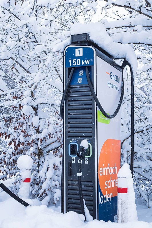Snowy charging station for electric cars with clear energy figures, Tesla Model Y electric car, ENBW charging station, Waldachtal, Freudenstadt district, Germany
